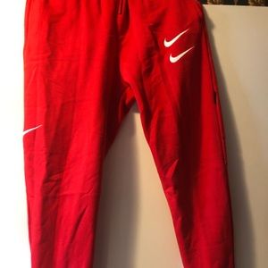 Red Nike double swoosh joggers